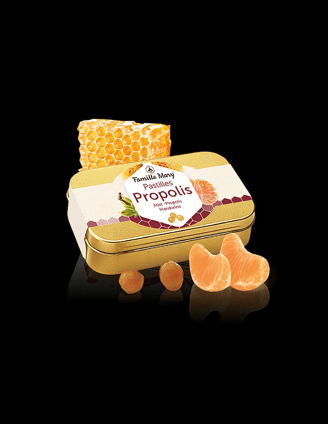 Бонбони за смучене с пчелен мед и прополис, с вкус на мандарина, 60 g  Famille Mary - Nutra Best Bulgaria